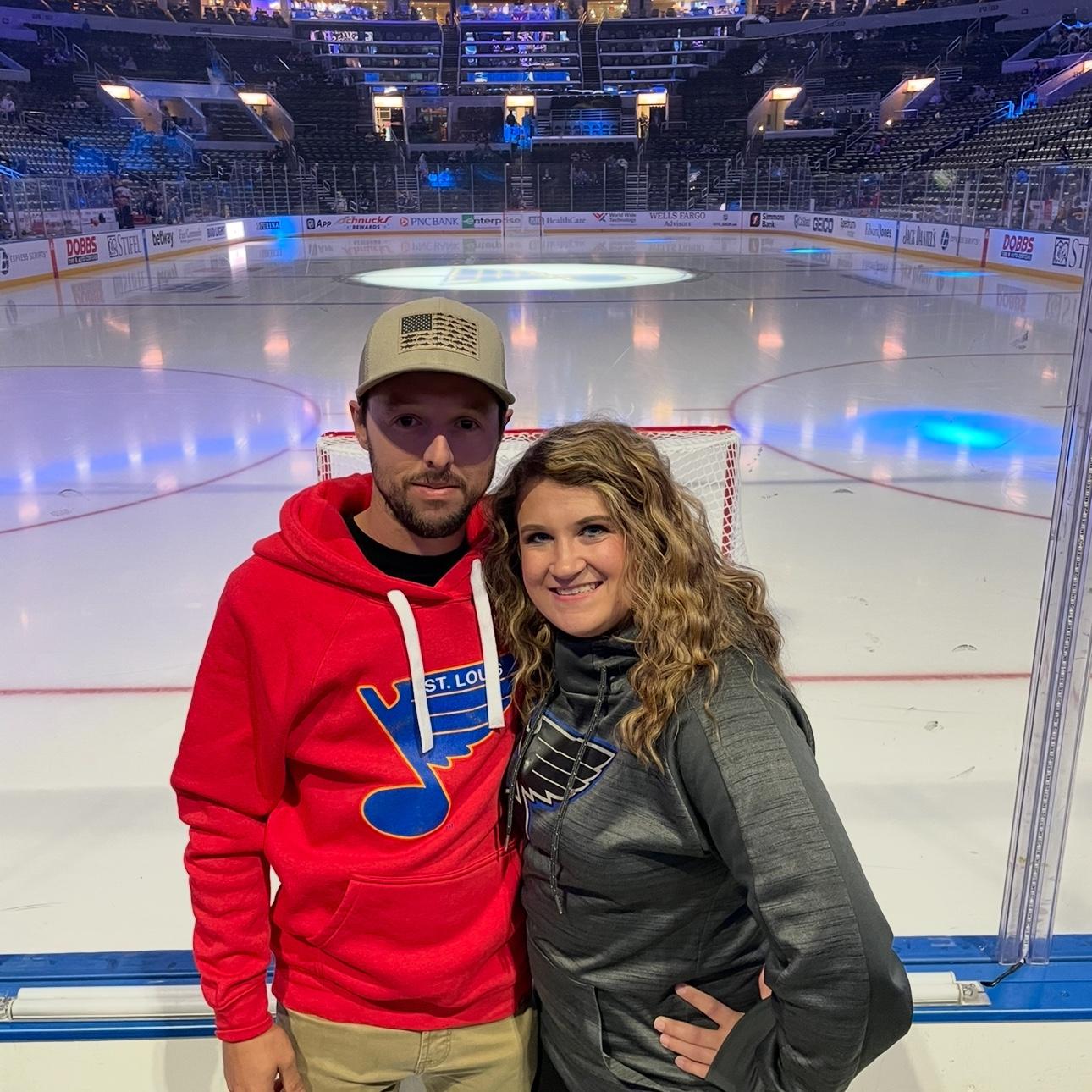 Our first of many St. Louis Blues games together (they won!).