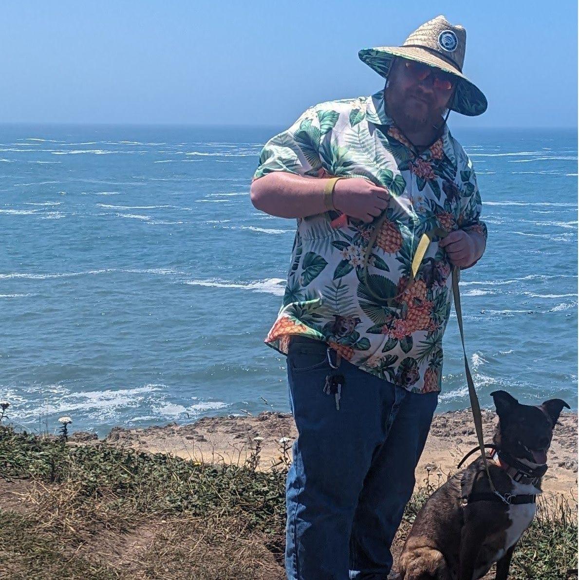 Alex showing off his style, featuring his Father's day gift, a Hawiian shirt customized with our dog, Lacey's, face on it.