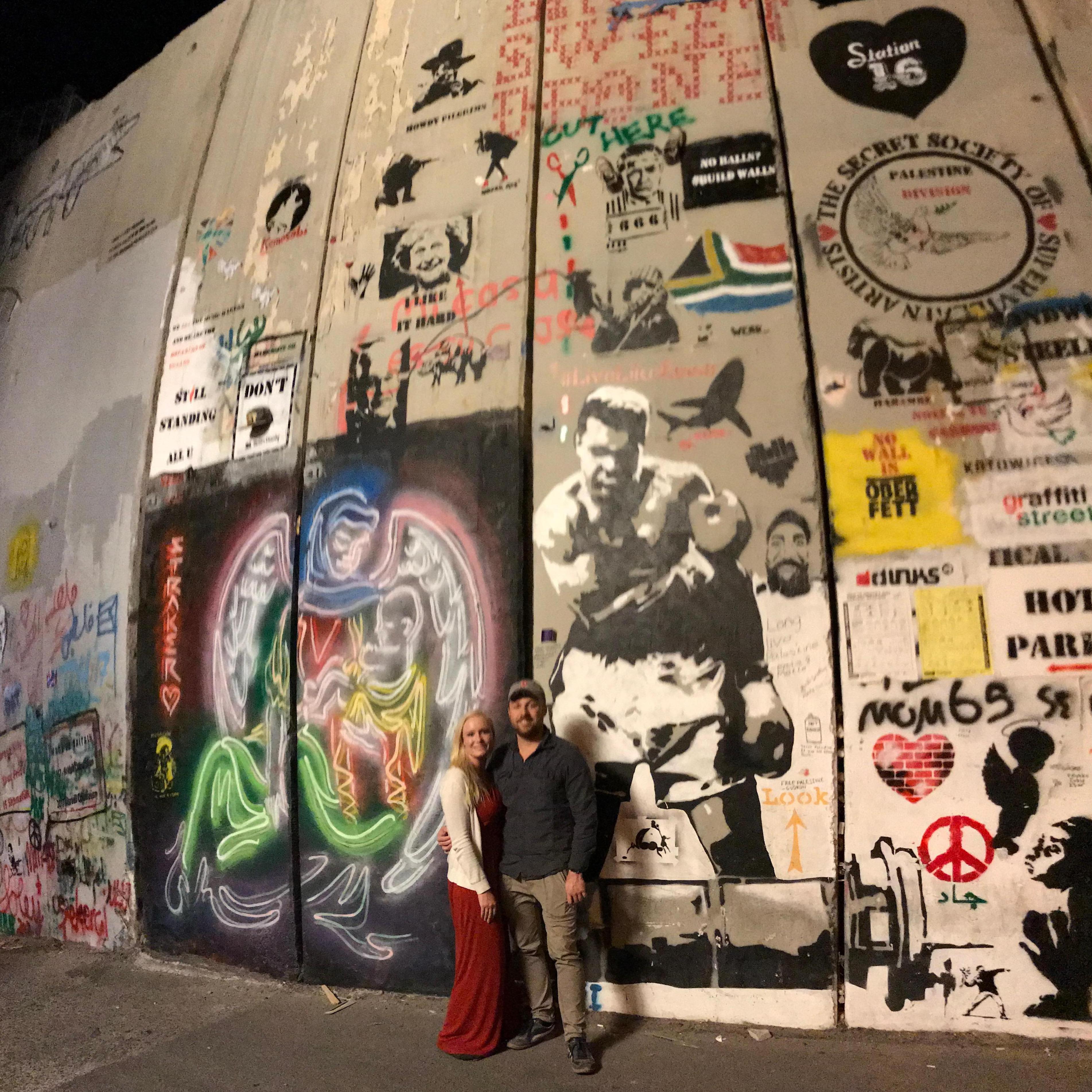 The West Bank Barrier in Bethlehem. Mohammed Ali's famous Lewiston, Maine picture!