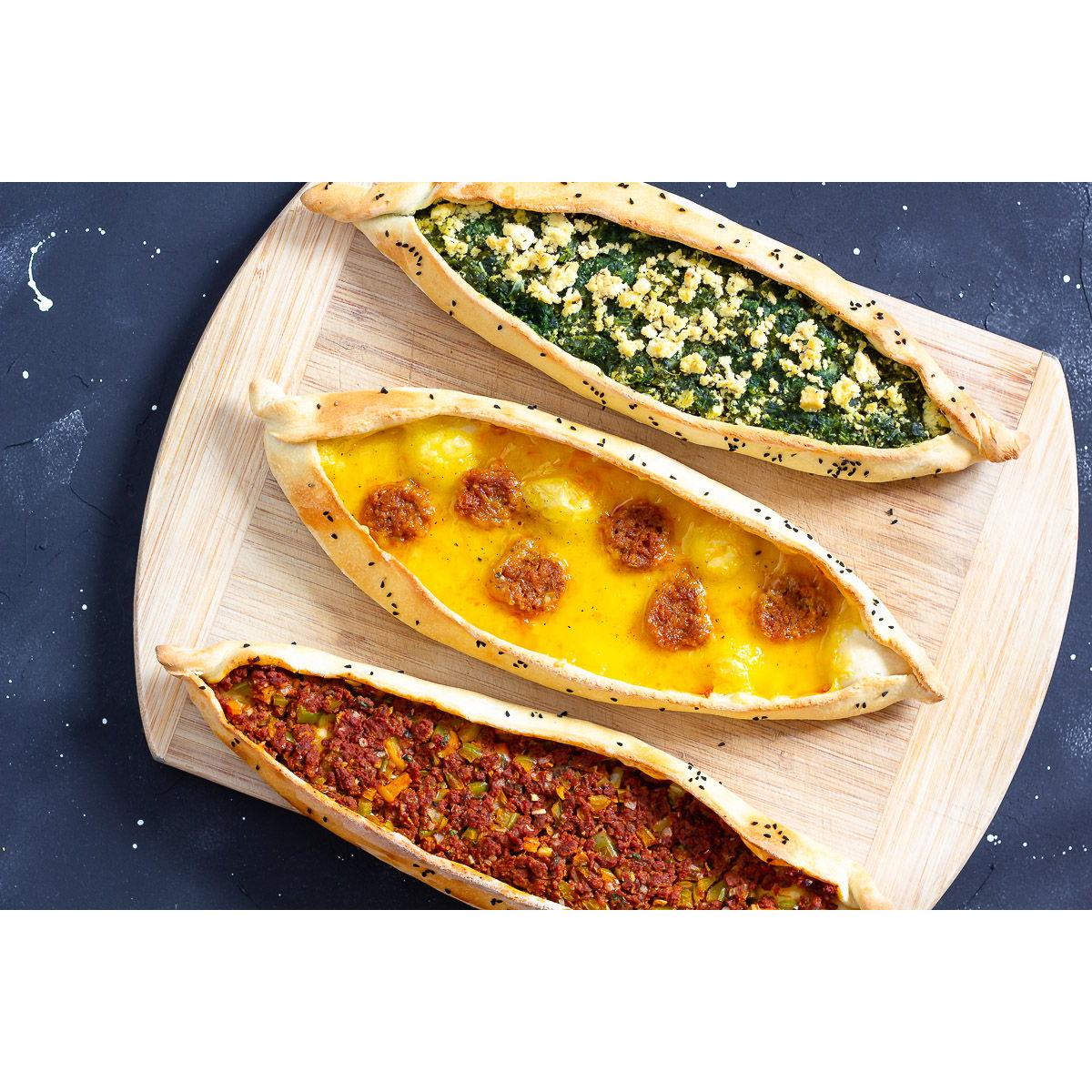 Pide is turkish flatbread. It can come with cheese, sucuk (turkish chorizo), meat, spinach and many other things!