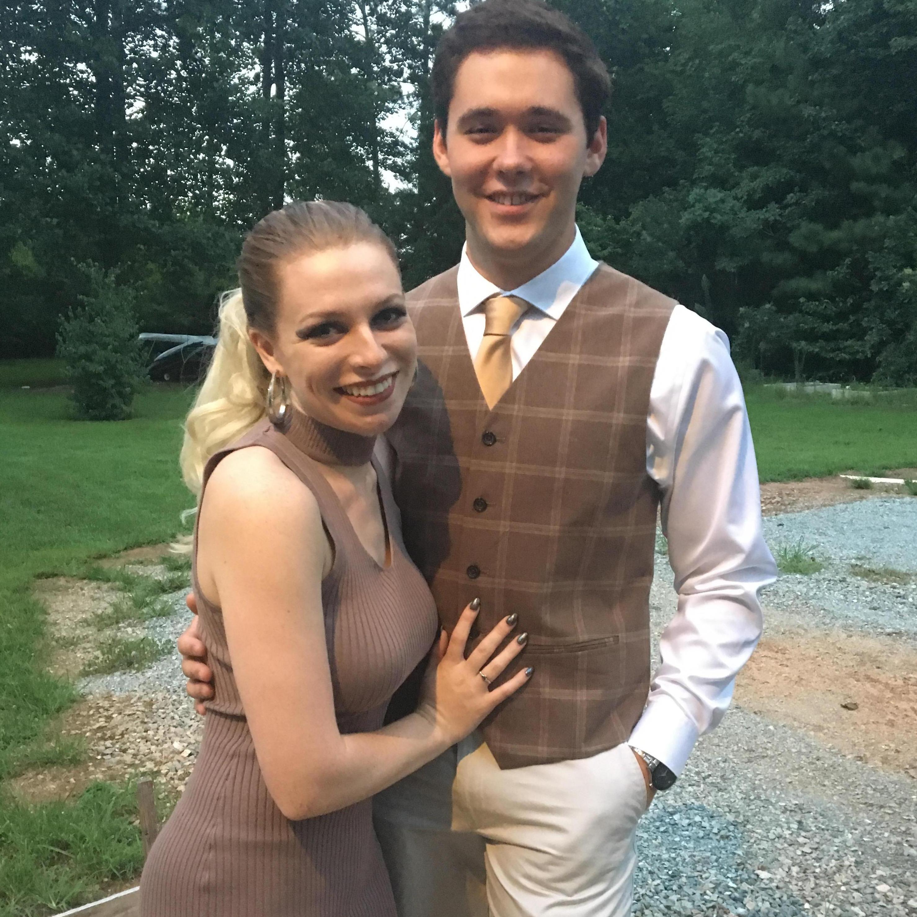 Posing in our date night matching outfits. (August 5, 2018)