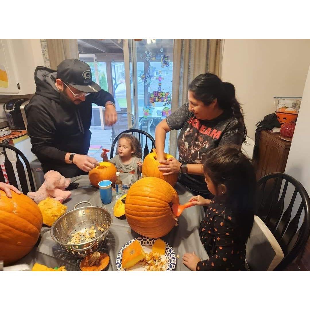 Tavio's first pumpkin carving. He did great!