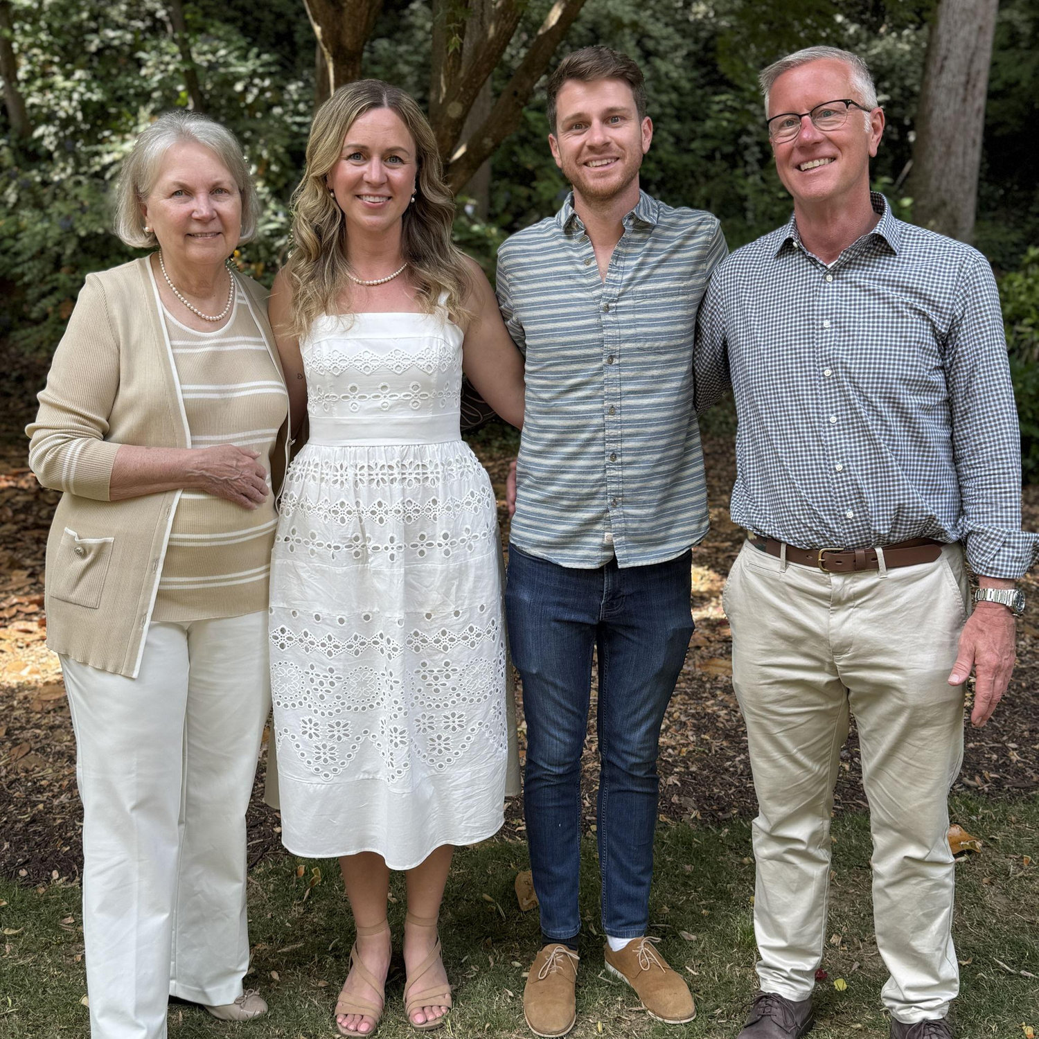Celebrating our engagement with Mary's mother Carol and Clarke's father Lamar
