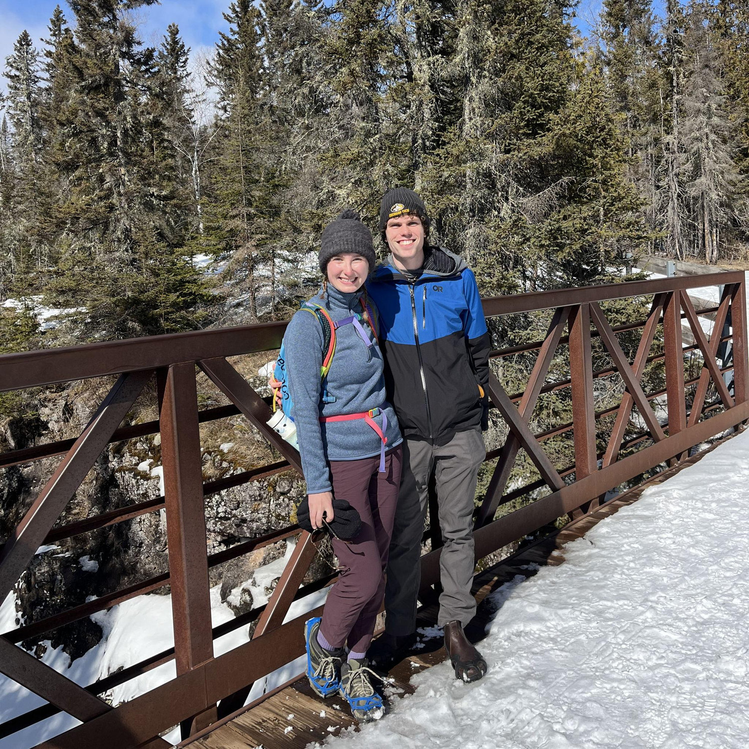 Our first photo together (we hiked to a bridge full of sunshine and ate peanut butter cups in the snow).