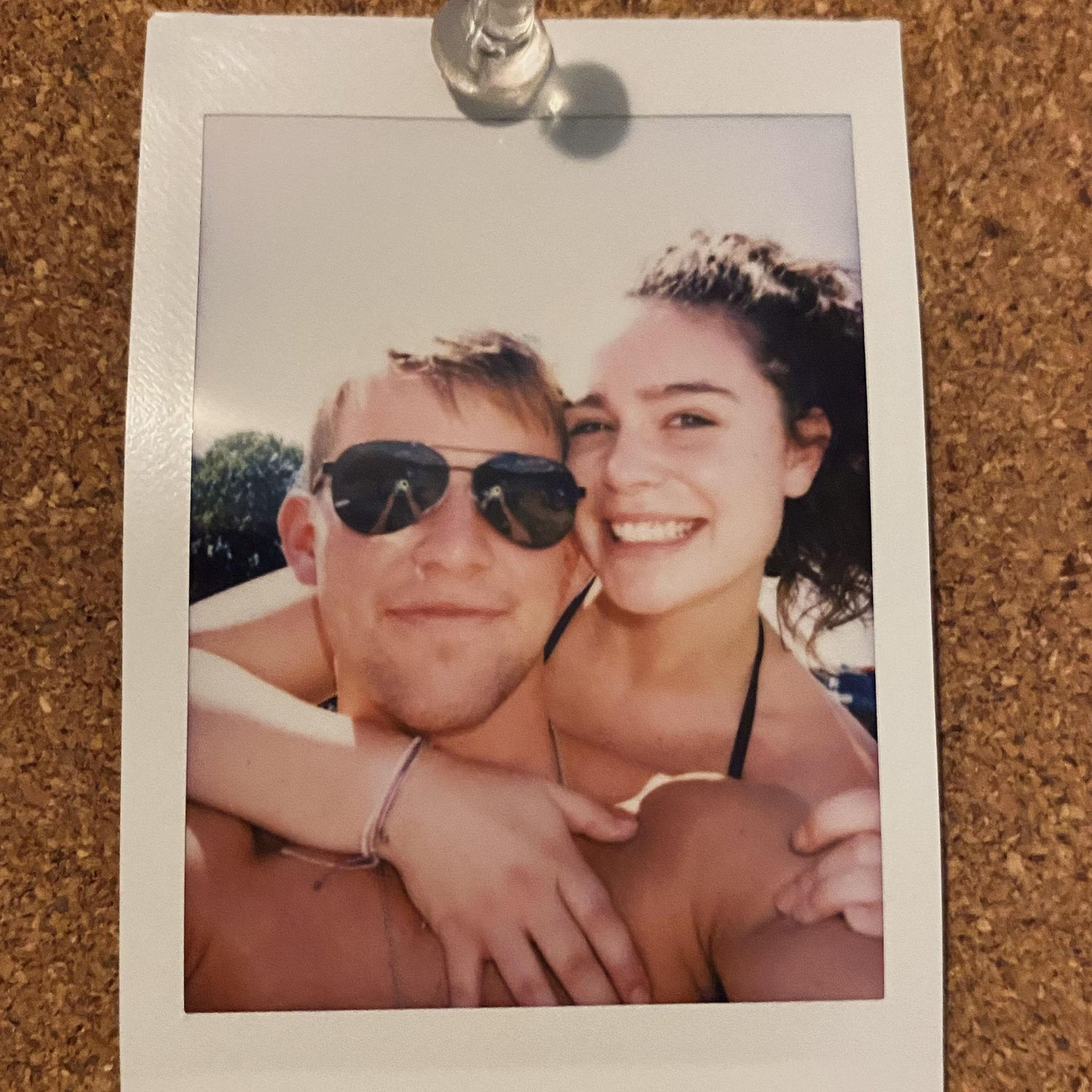 When we were long distance we started a tradition of taking a polaroid picture together every time we saw each other! This was our first one.