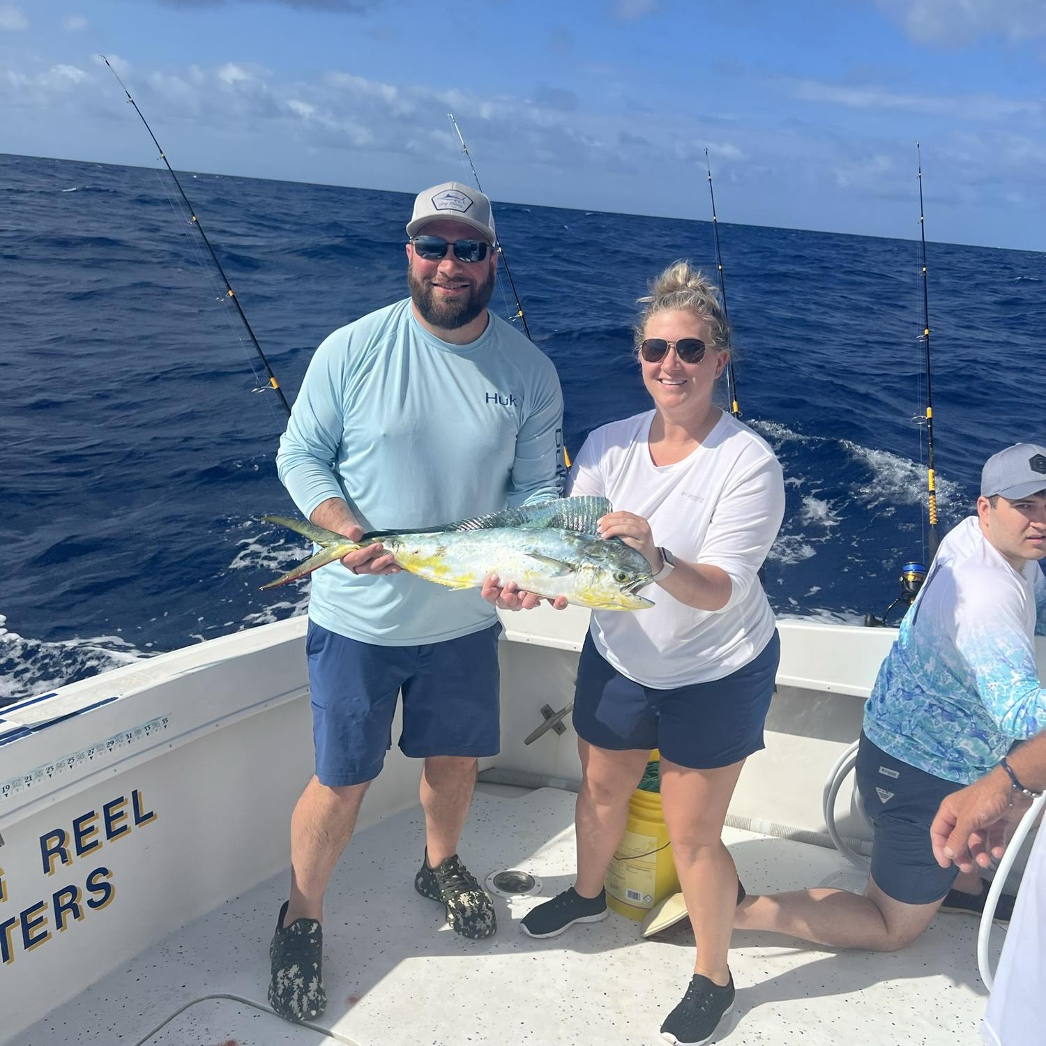 One of our favorite things to do is go on fishing charters! This is us catching Mahi in the Florida Keys (don't mind Jenn's brother in the background, he wasn't feeling so hot on this trip).