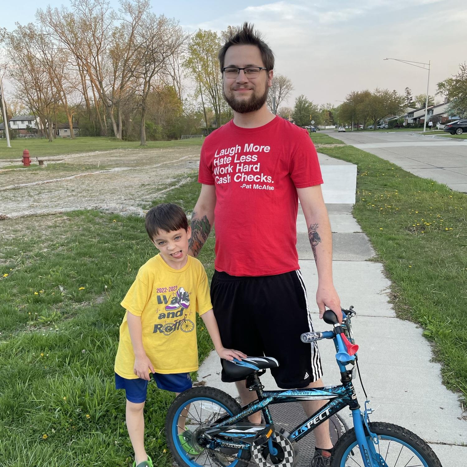Teaching him to ride a bike