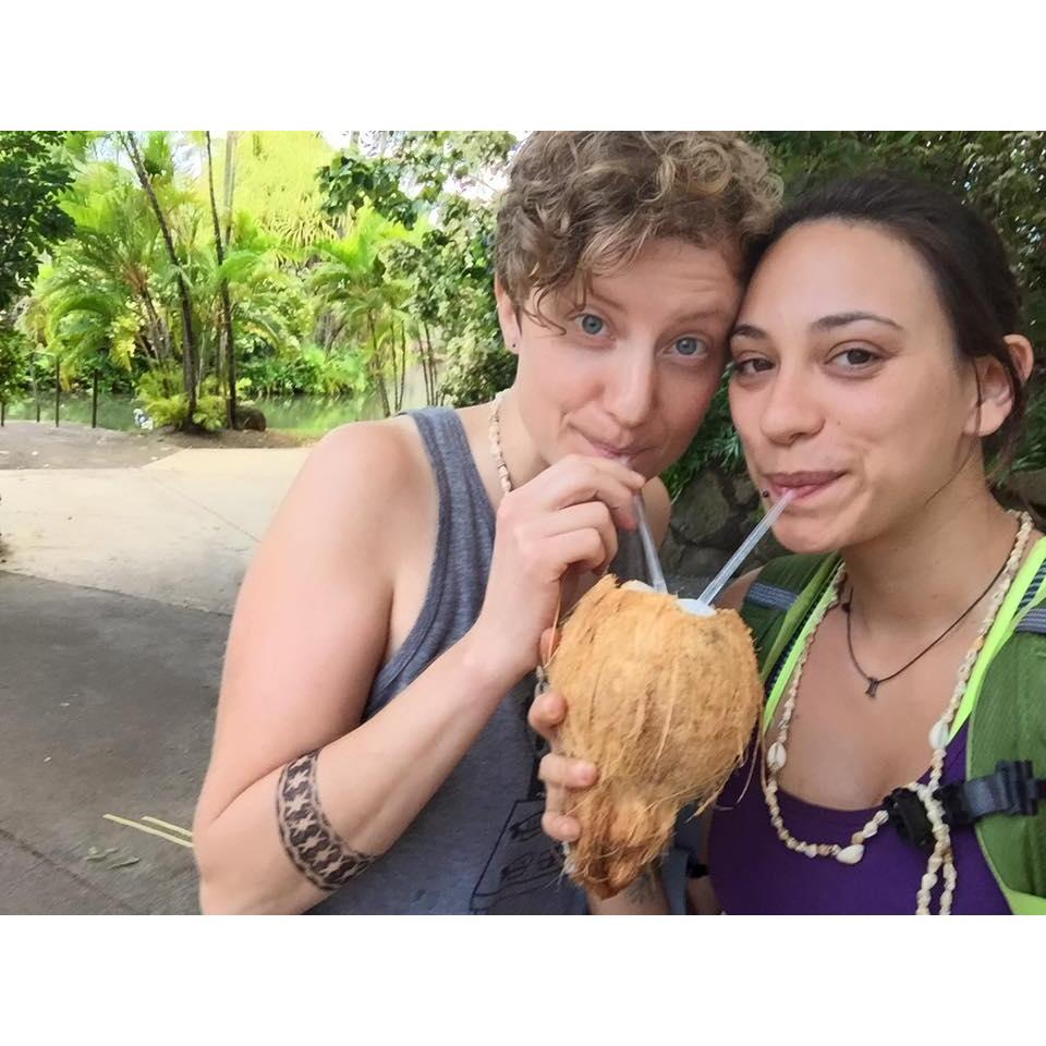 Sipping water from a fresh coconut - Oahu, HI - 2015