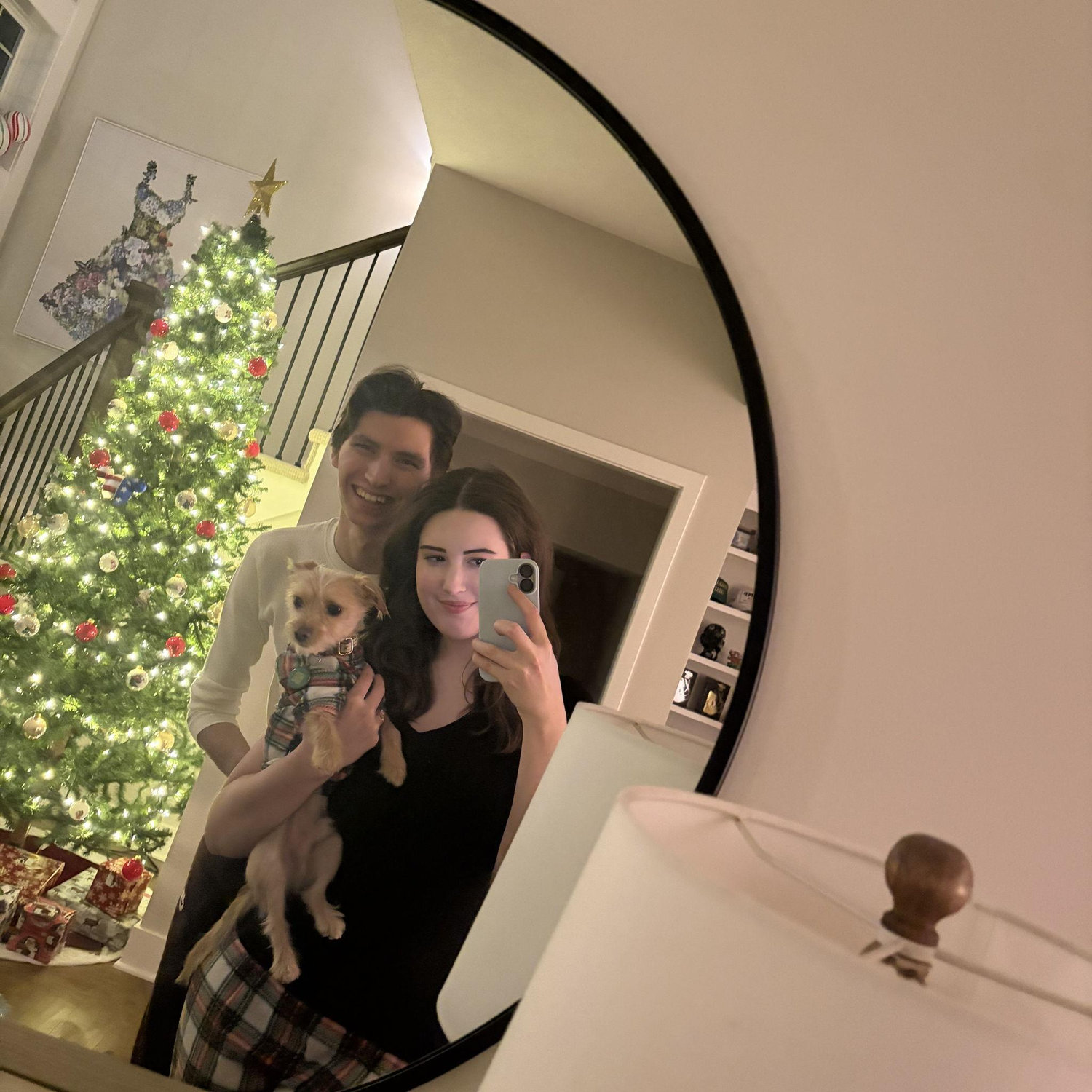 Margo and William celebrating Christmas at their house.