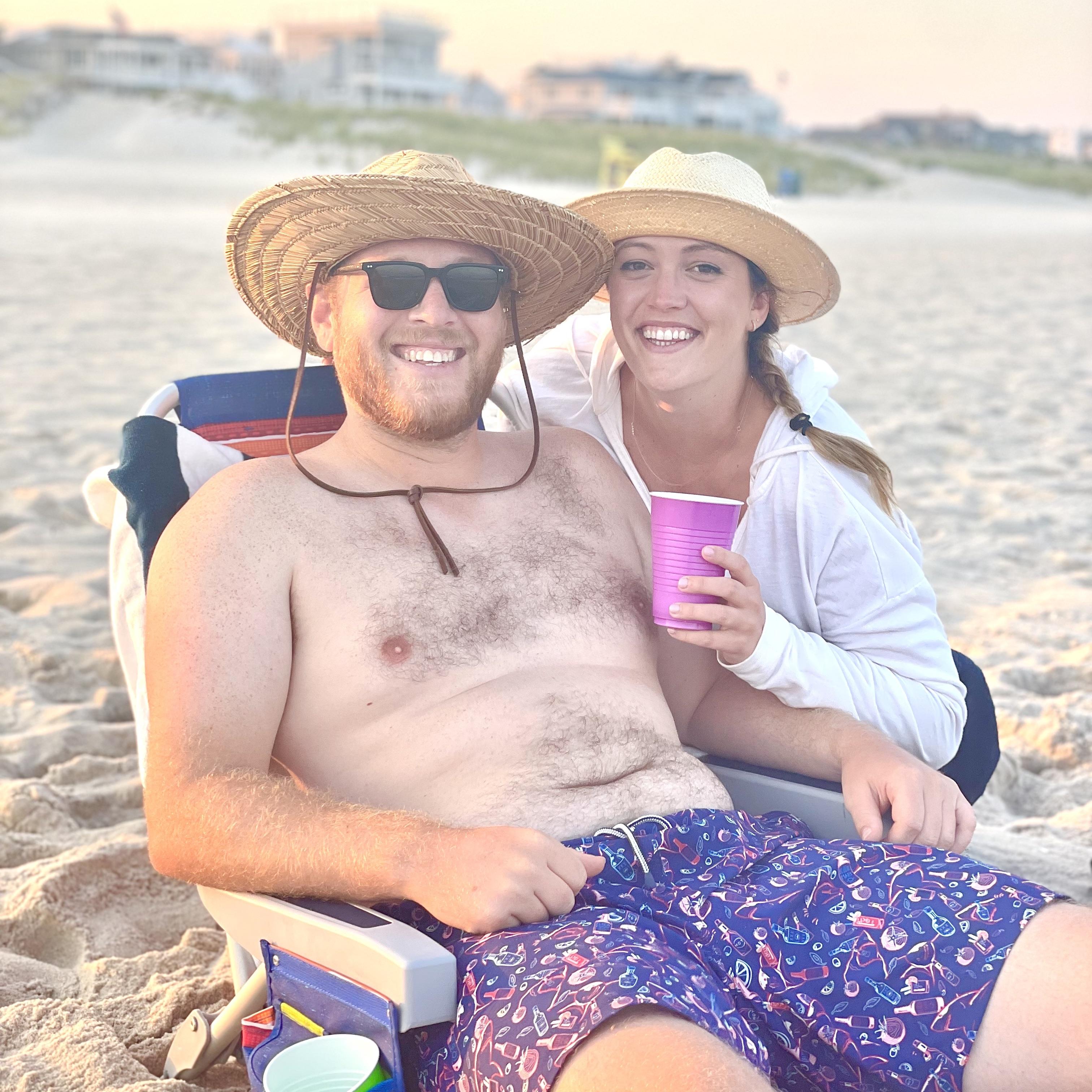 Our happy place- golden hour on the beach with a cocktail in hand!