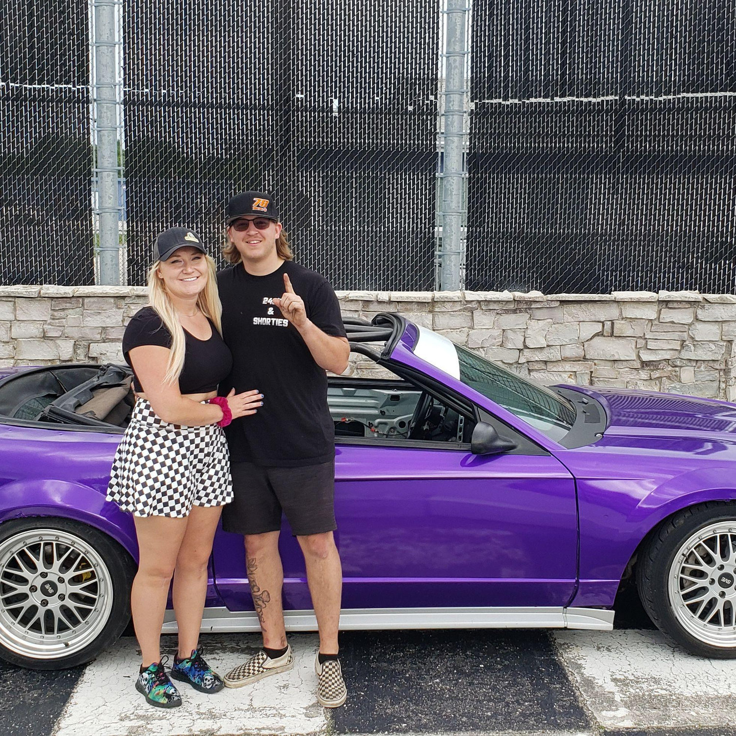 Erik drift racing in his purple Mustang