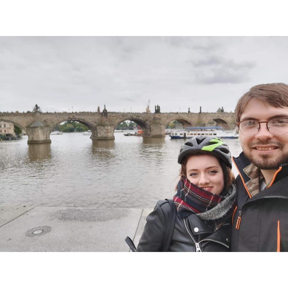 Quick break for a photo on our bike tour of Prague .. Ashley too cool for a helmet ...