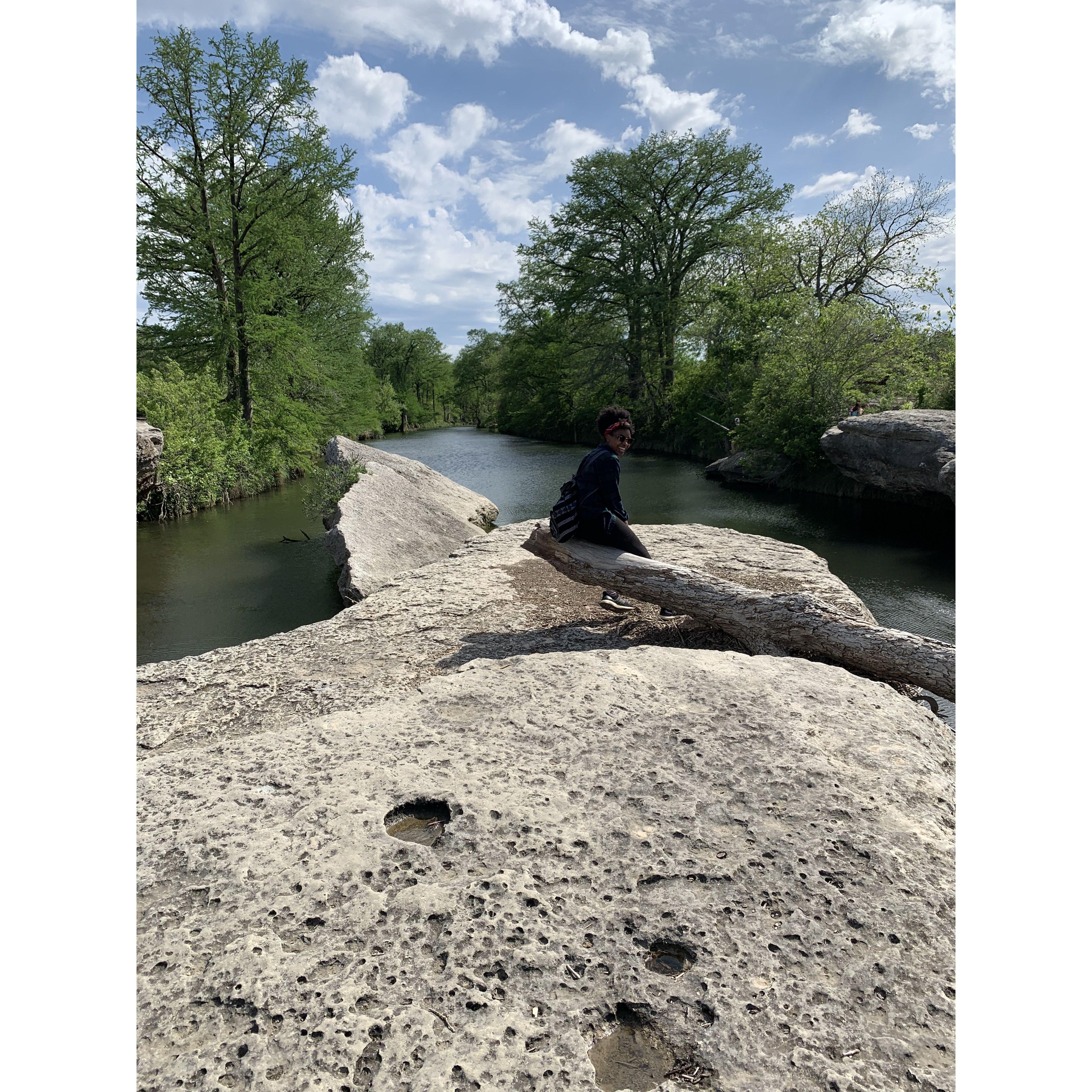 Nia on another rock