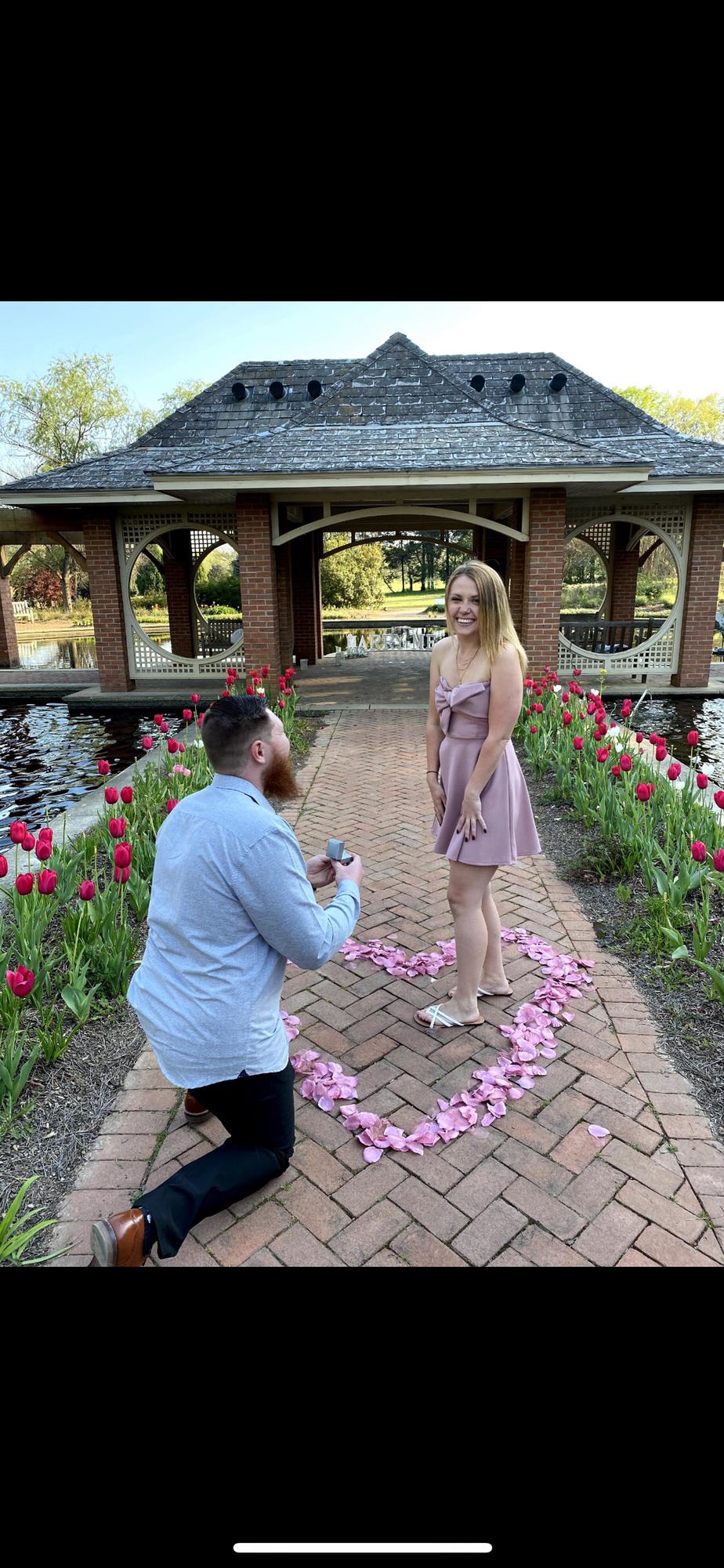 This was right after Ryan proposed to me. We had to reenact it so I didn't look so shocked. Such an incredible day that I will never forget.