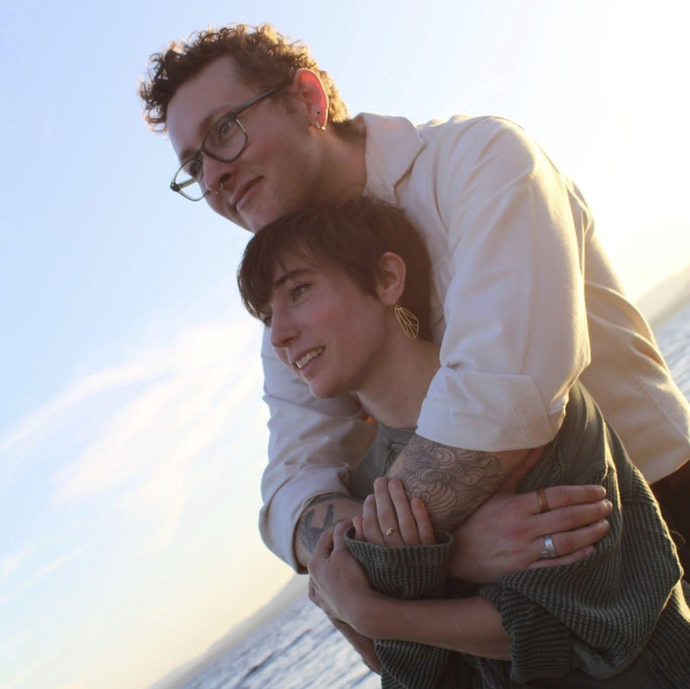 We feel incredibly lucky to have met and grown within this environment, and are thrilled to share it with you as we celebrate our wedding day.

(Photo Credit: Caitlin Durkin)