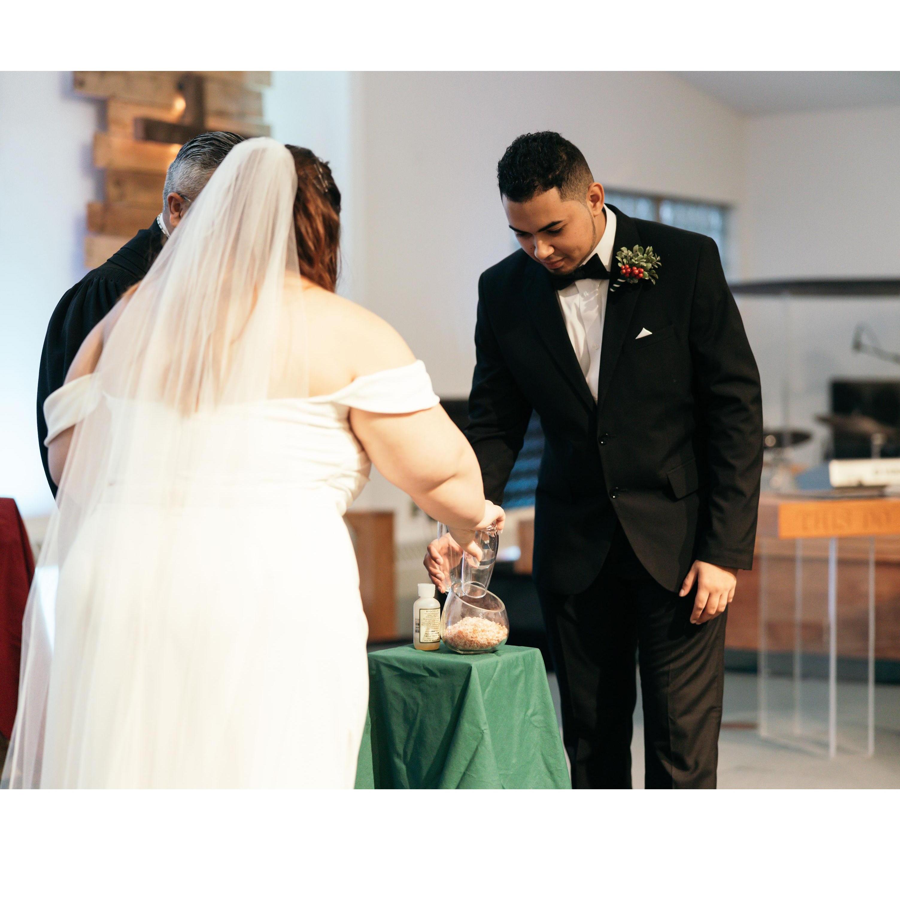 Salt ceremony- In the Bible it was said that whenever two people made a pact, they would bind their deal with salt. The salt when mixed, cannot be separated. Our Pastor added anointing oil to seal.
