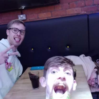 Our first photo together. I honestly thought I was hiding under the table.