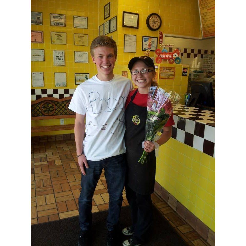 April 2014, when Pat surprised Madi at work to ask her to prom! Fun fact: his shirt had two check boxes on them for Madi to choose her answer, both of which said "yes."