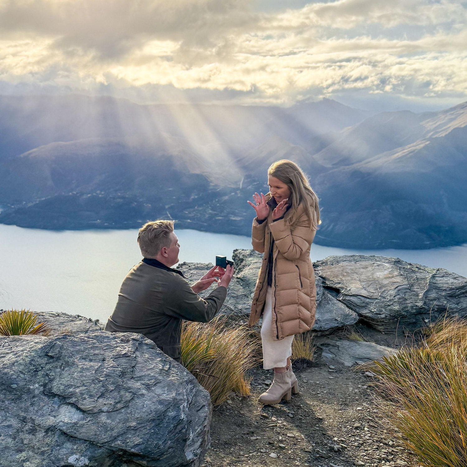 On a windy cliff in NEW ZEALAND, Dillon asked me to marry him! The best day of our lives!