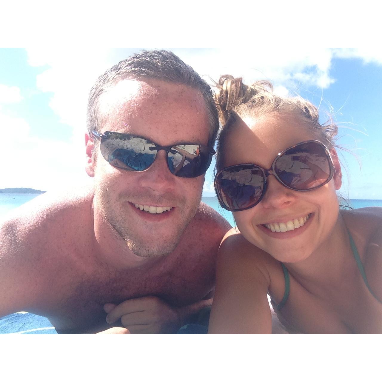 September 2013- One of our first photos together, on our favorite beach in the USVI, Cinnamon Bay on St. John