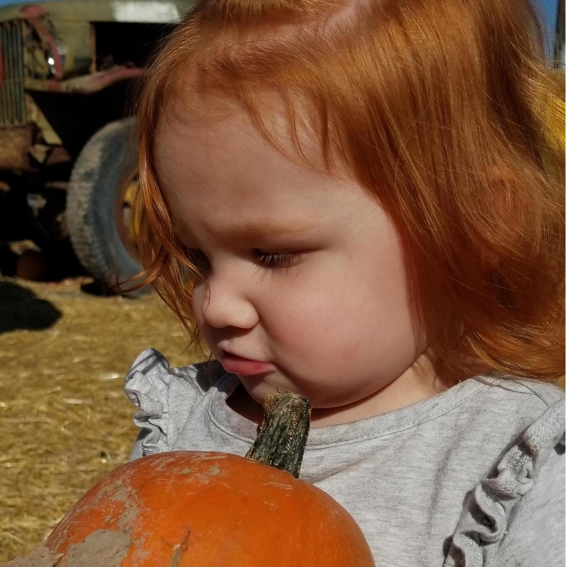 Emma with her pumpkin - October 2018