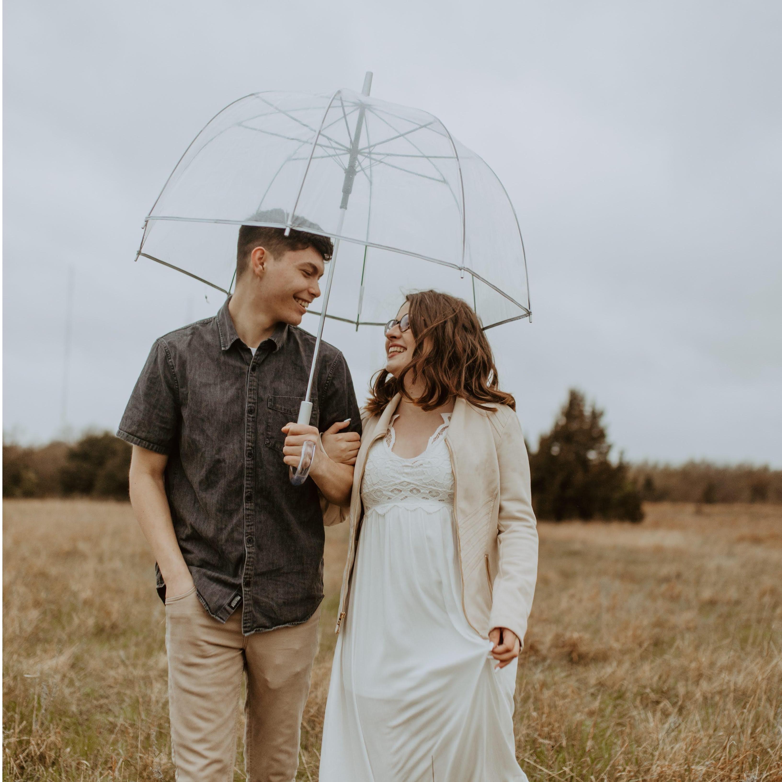 March 2021. The Couple takes their engagement photos! The bride was freezing her bottom off in these images! And the umbrella was the real star! It saved the day! Brrr!!!
