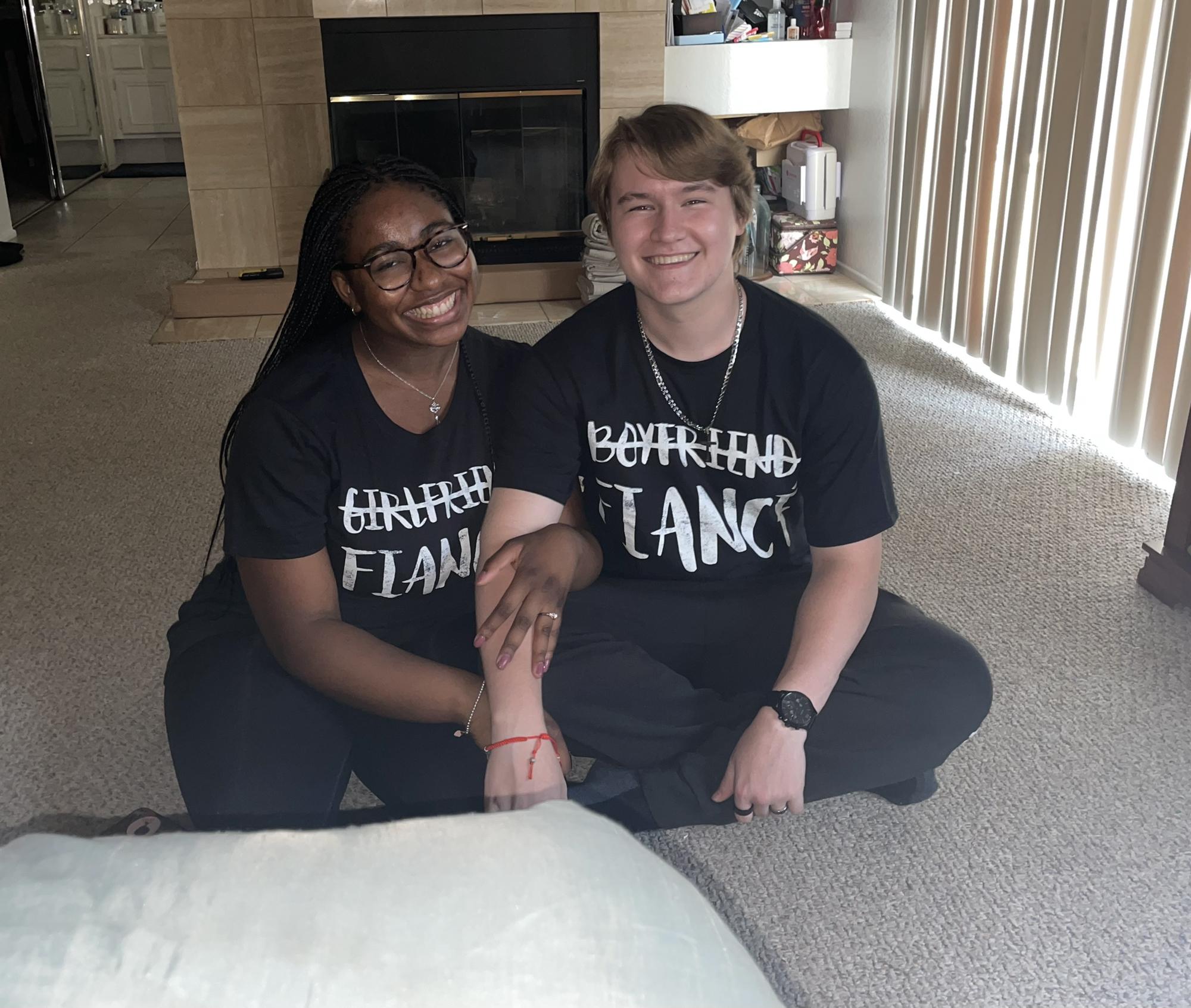 Here's us in our matching fiancé shirts my mom gave us! We love them!