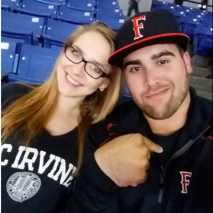Cheering on our schools at a College Basketball game!  UCI won!! 2016
