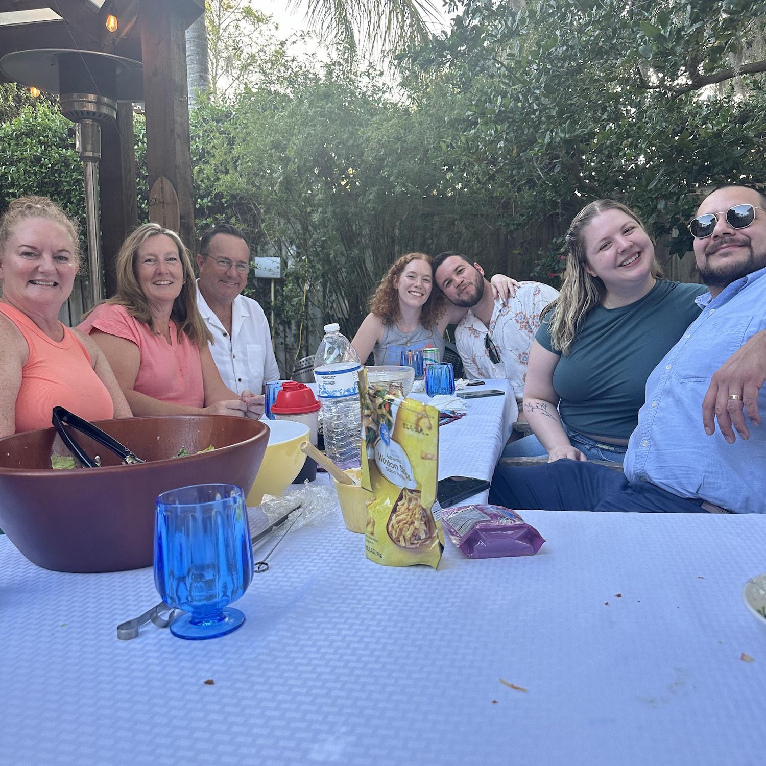Emily’s family had a fun dinner in the backyard with friends!