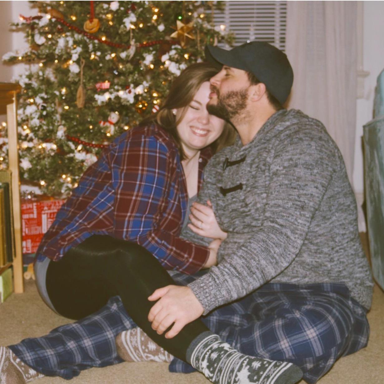 Newly engaged bliss! In our first apartment, in front of our first Christmas tree, enjoying being every bit in love!
