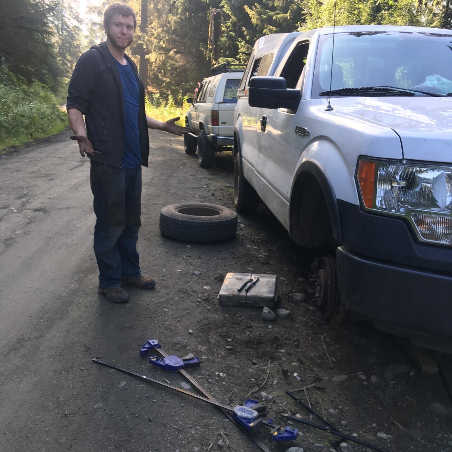 Fixing the breaks after our first trip up and down Flower Mountain