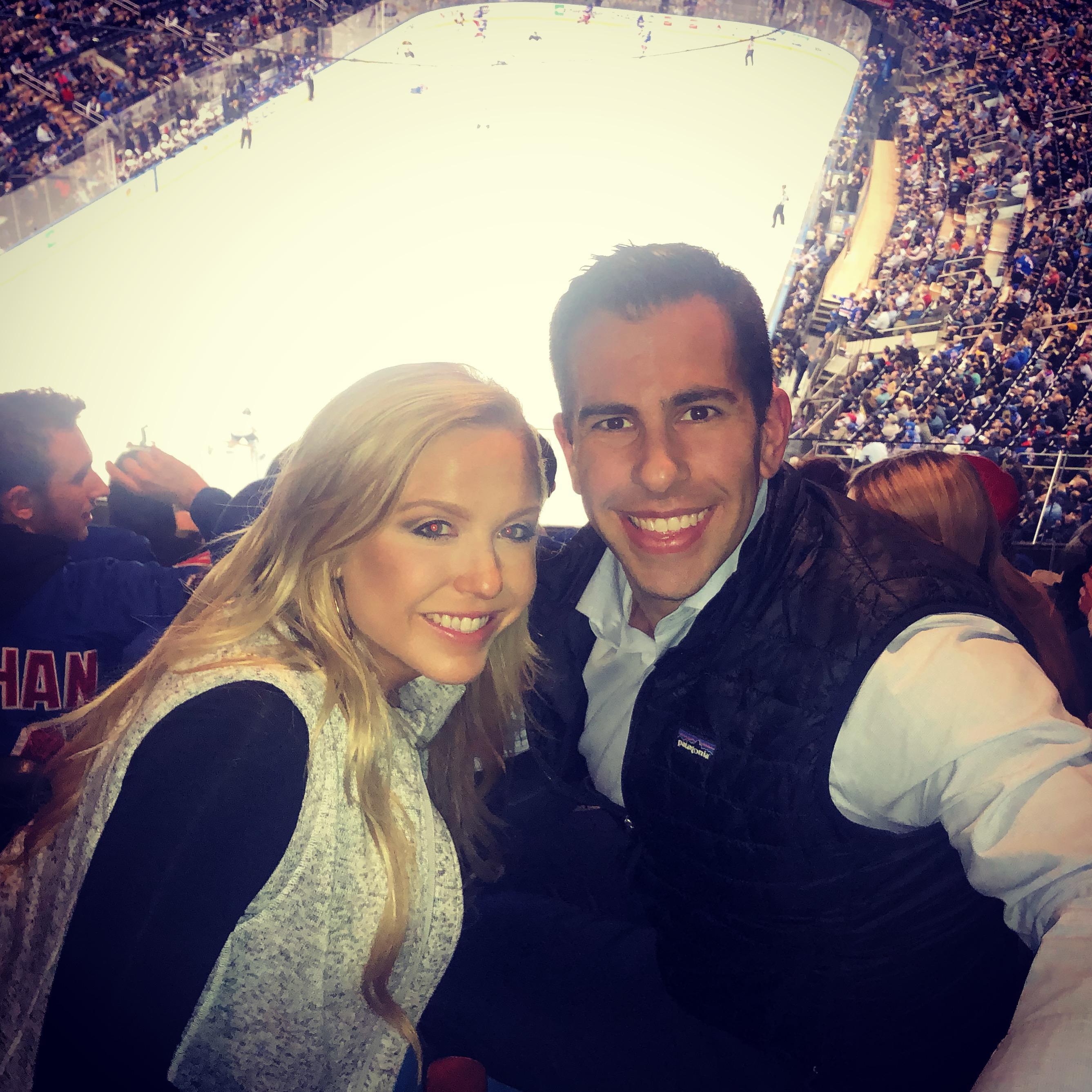 One of our first dates. Kaitlin surprised Jonathan with dinner and a Rangers game!