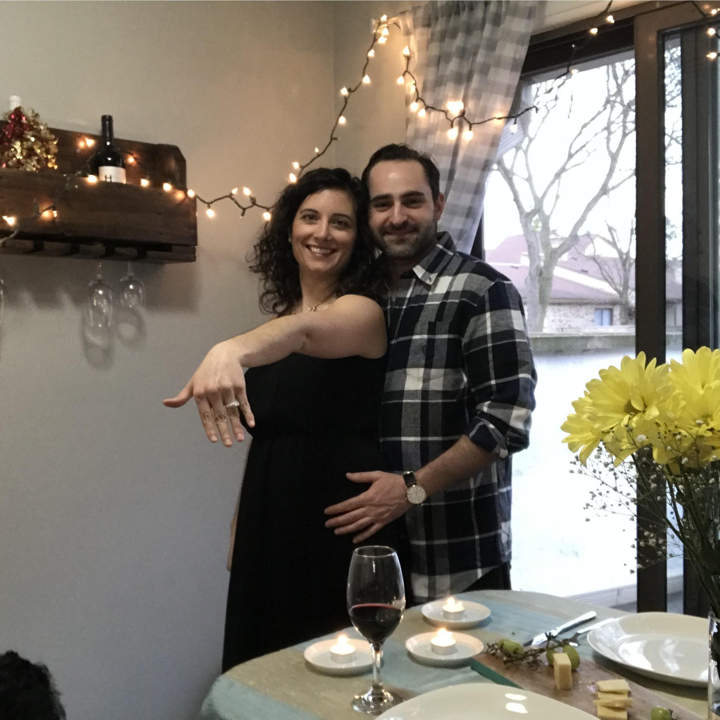 Mike proposed just hours after we decided to cancel our trip to Jamaica, saying "I don't want to wait another day" - lights and flowers in our kitchen during covid is WAY more memorable!