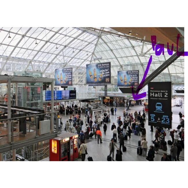 Image of the Paul Bakery on Platform 23. Coaches will be just past this on the left.