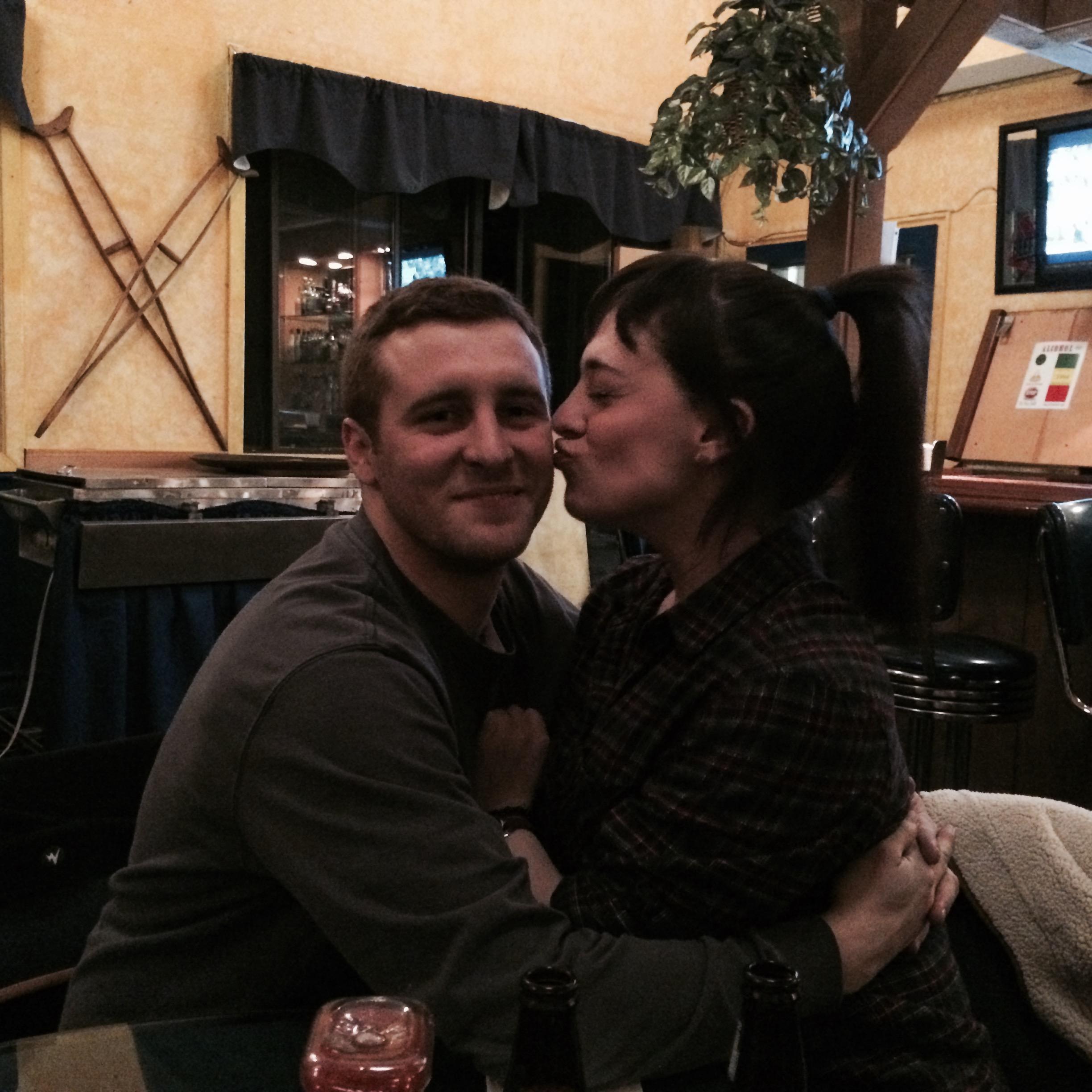 What a smooch! Rachel gives Alex a loving kiss on the cheek at a Vermont restaurant while enjoying a snowy weekend in this photo from 2014.