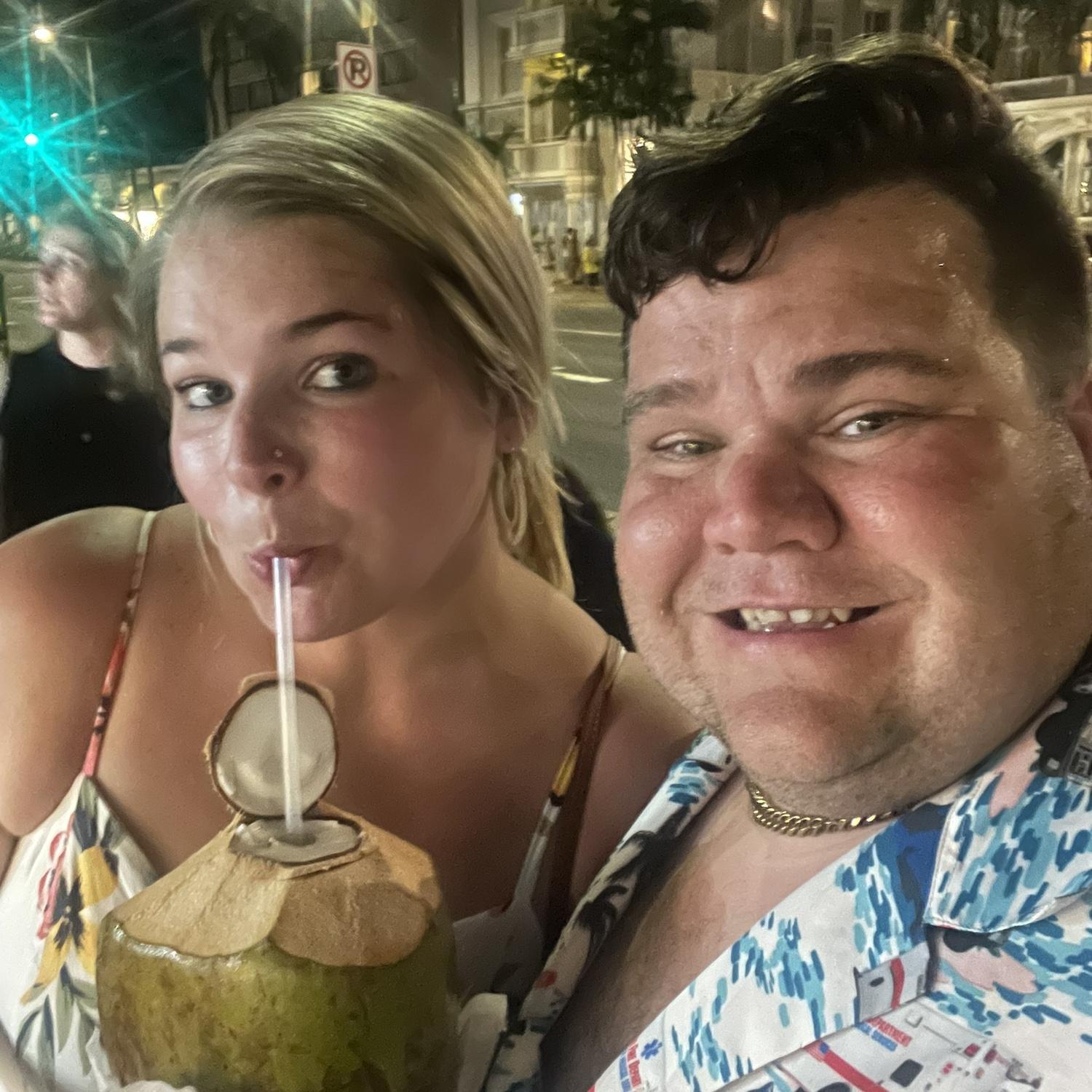 another picture from our first vacay when tommy fulfilled my dreams of drinking from a coconut by buying of from the man on the street.