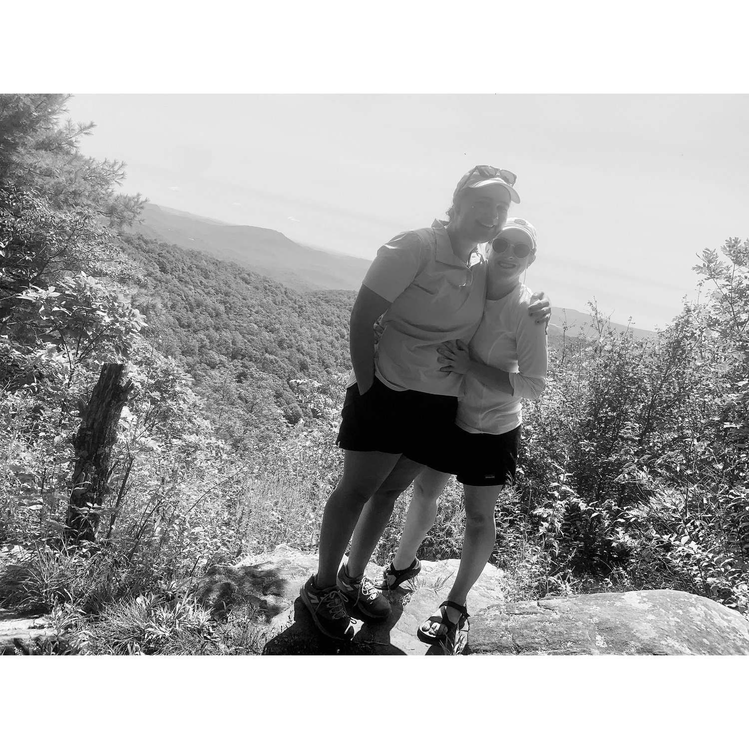 2020 - Social distancing in Georgia after Emma was stung on both middle fingers by a bee. Fun fact: Walking part of the Appalachian Trail was on Sam's bucket list - we hiked 7 miles of it on this day.