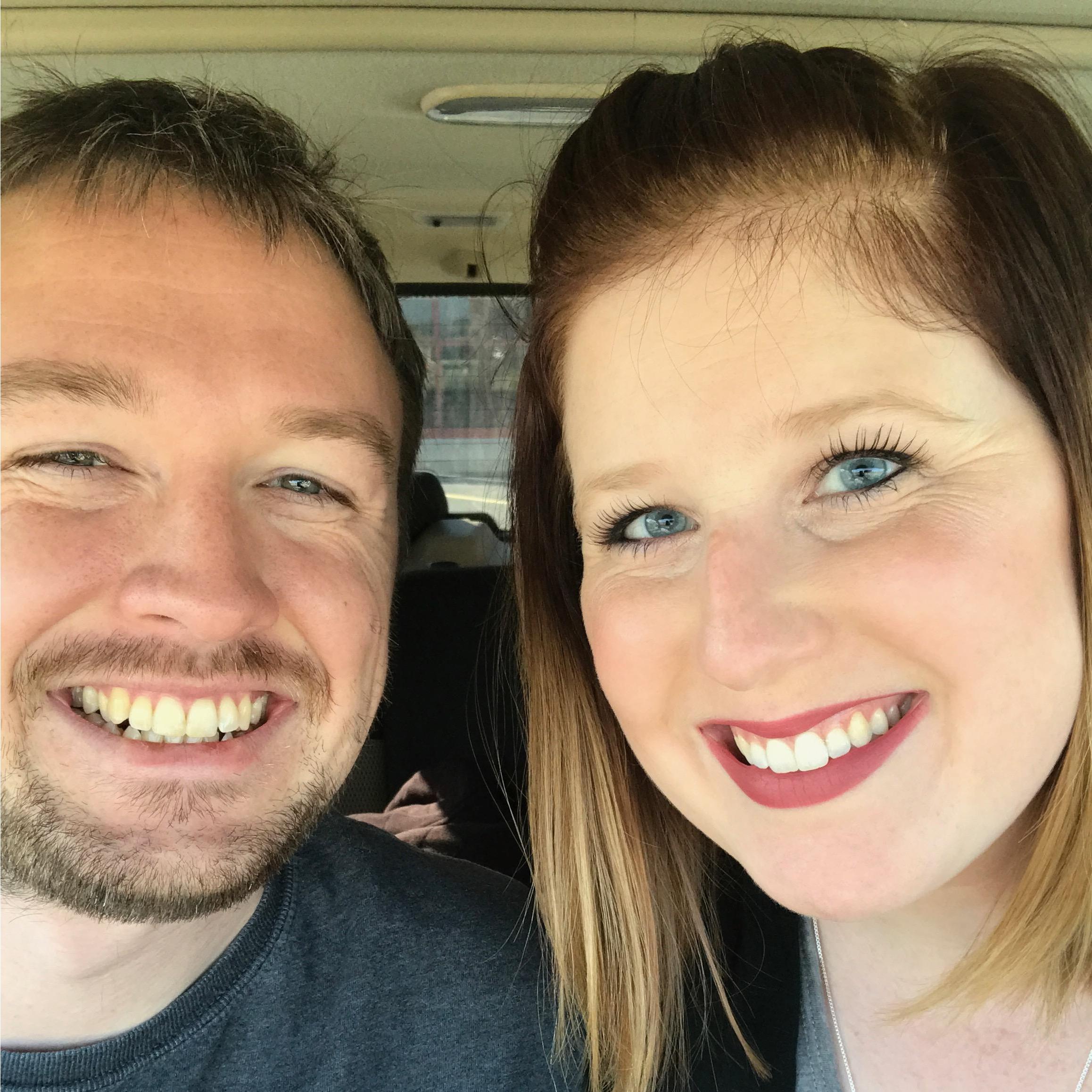 Happy campers after buying our first couch!