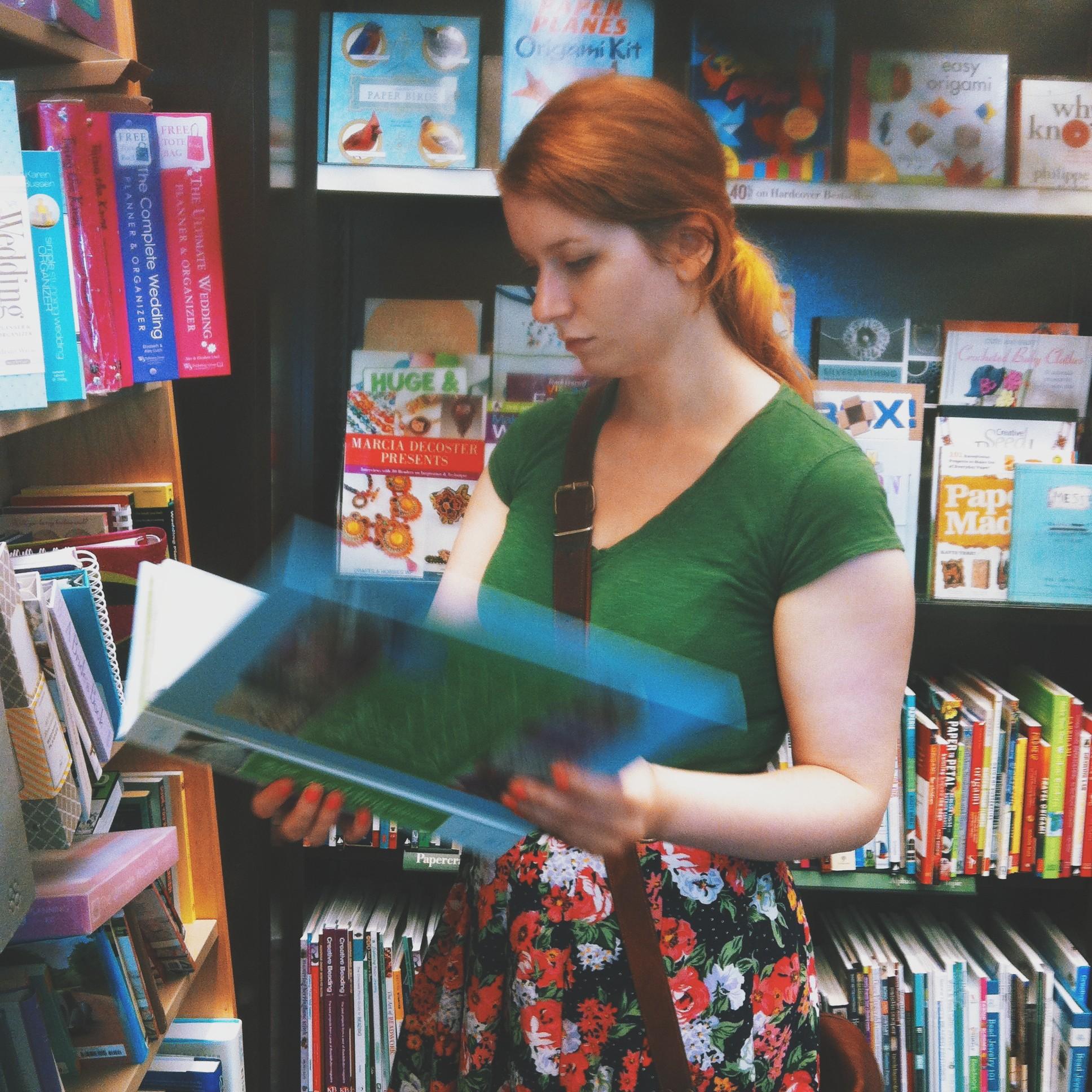 August 27th, 2014:
While exploring bookstores in Ann Arbor, Emilio snapped this shot of Samantha in her element. 📚🐛