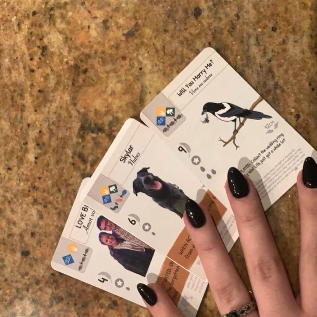 Austin proposed with custom cards from our favorite board game.