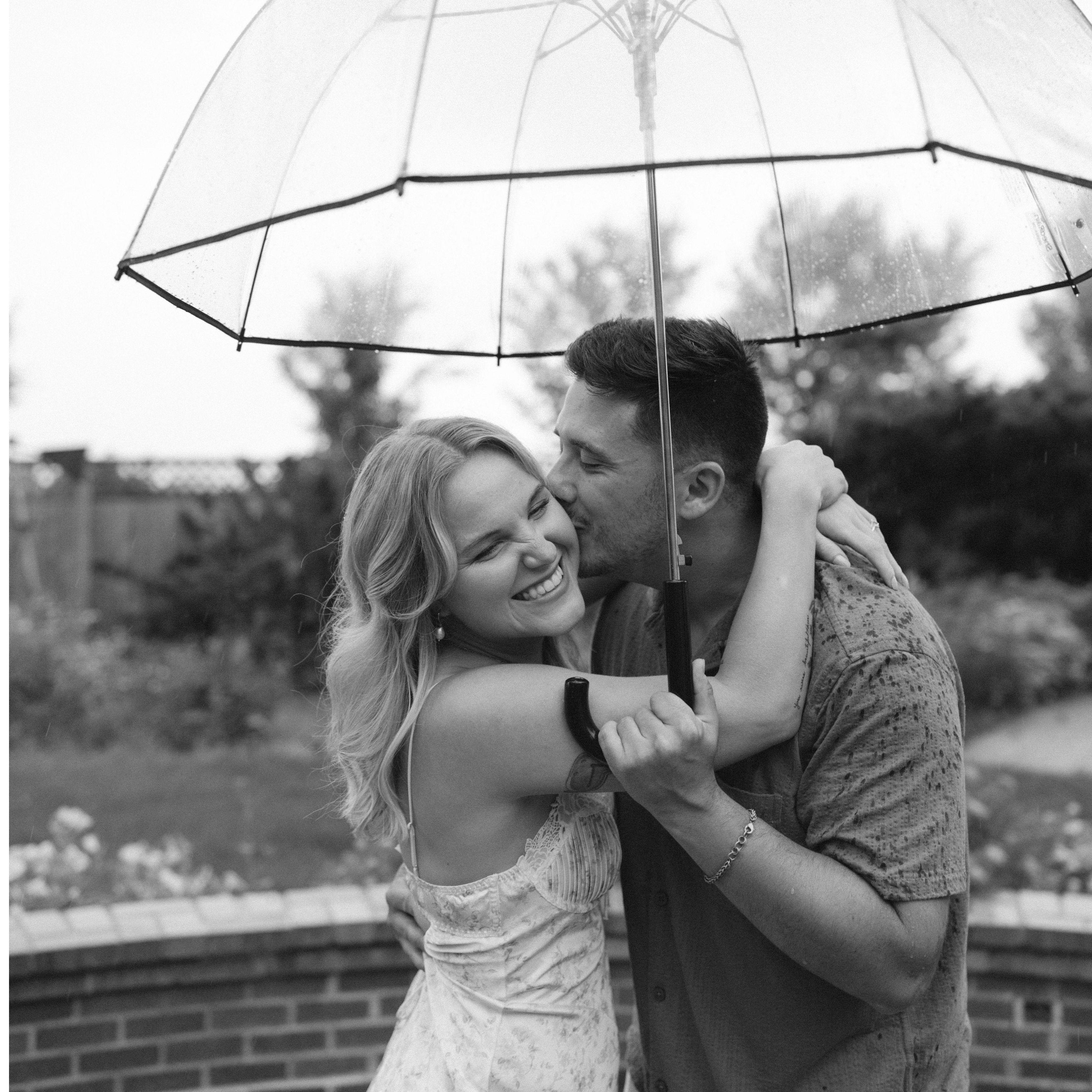 It was pouring during our engagement photo shoot, but we made the best of it!