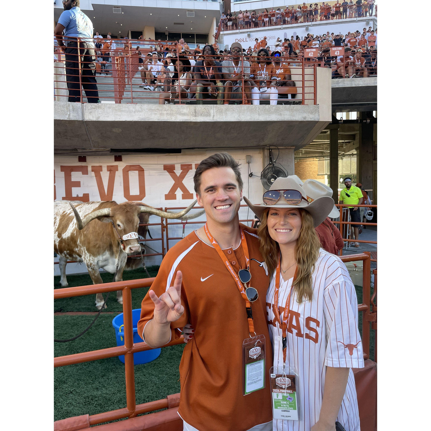 On the field of a UT football game with Bevo