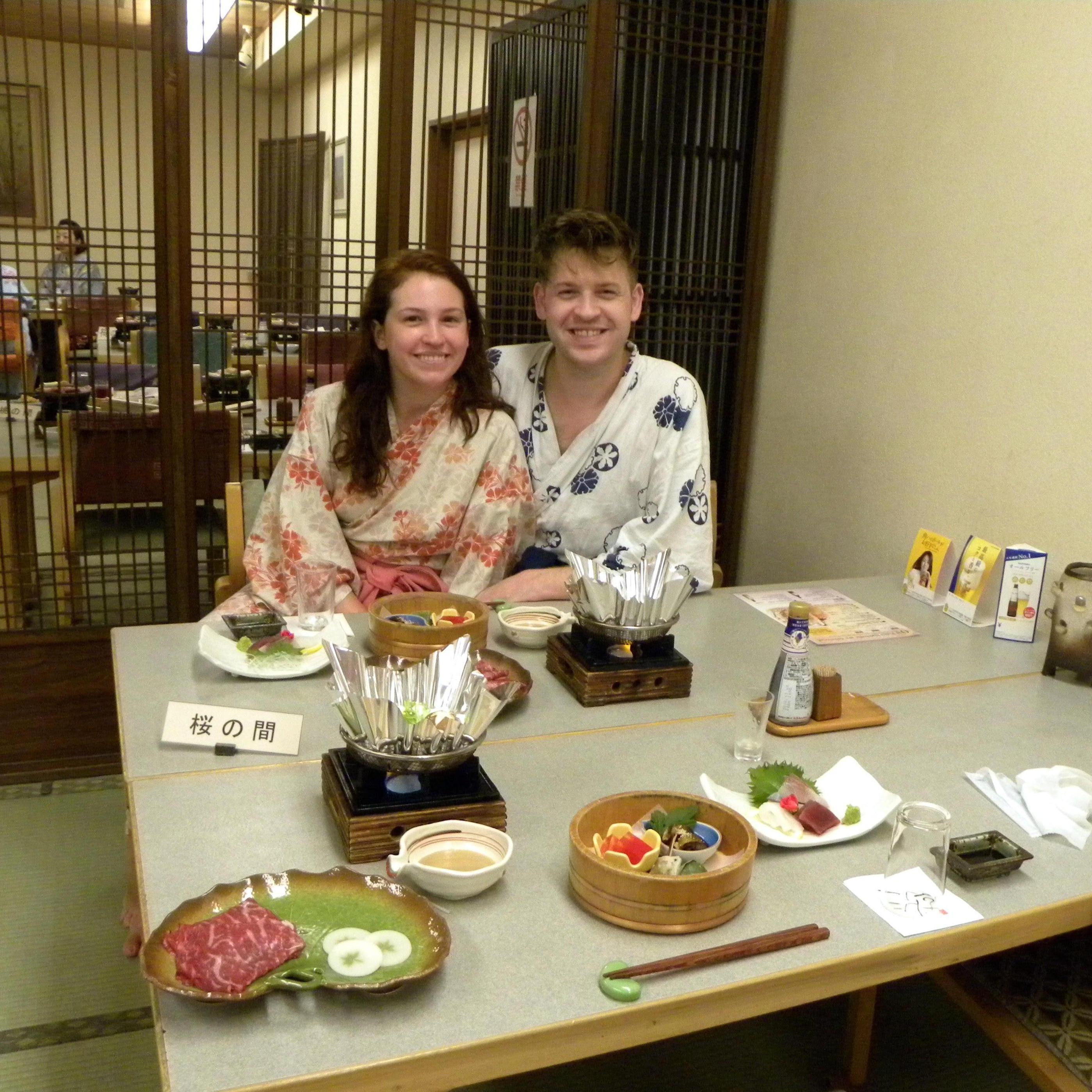 Enjoying a traditional meal at a hot spring in Japan