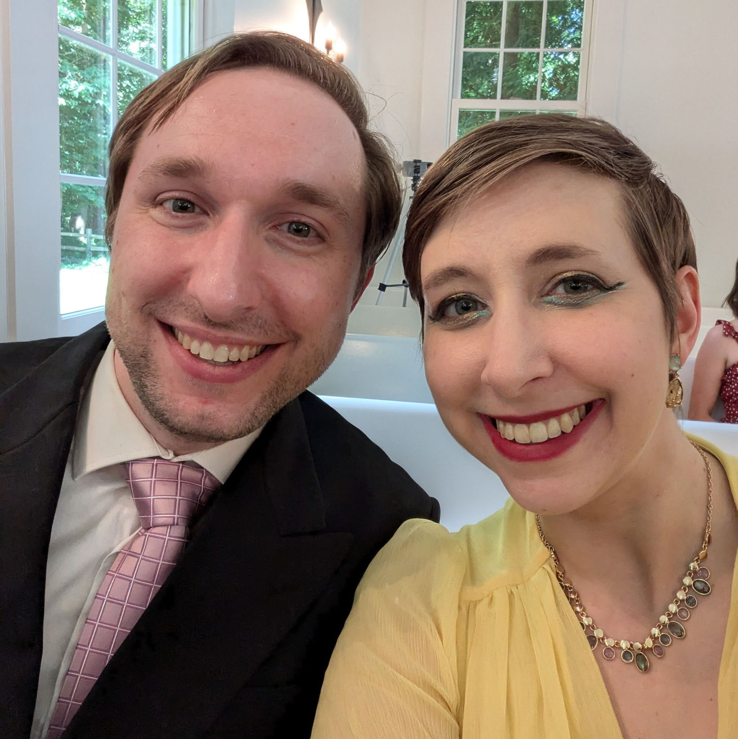 Summer 2024: At Brian's friend Ethan's wedding, Erin and Brian take a selfie