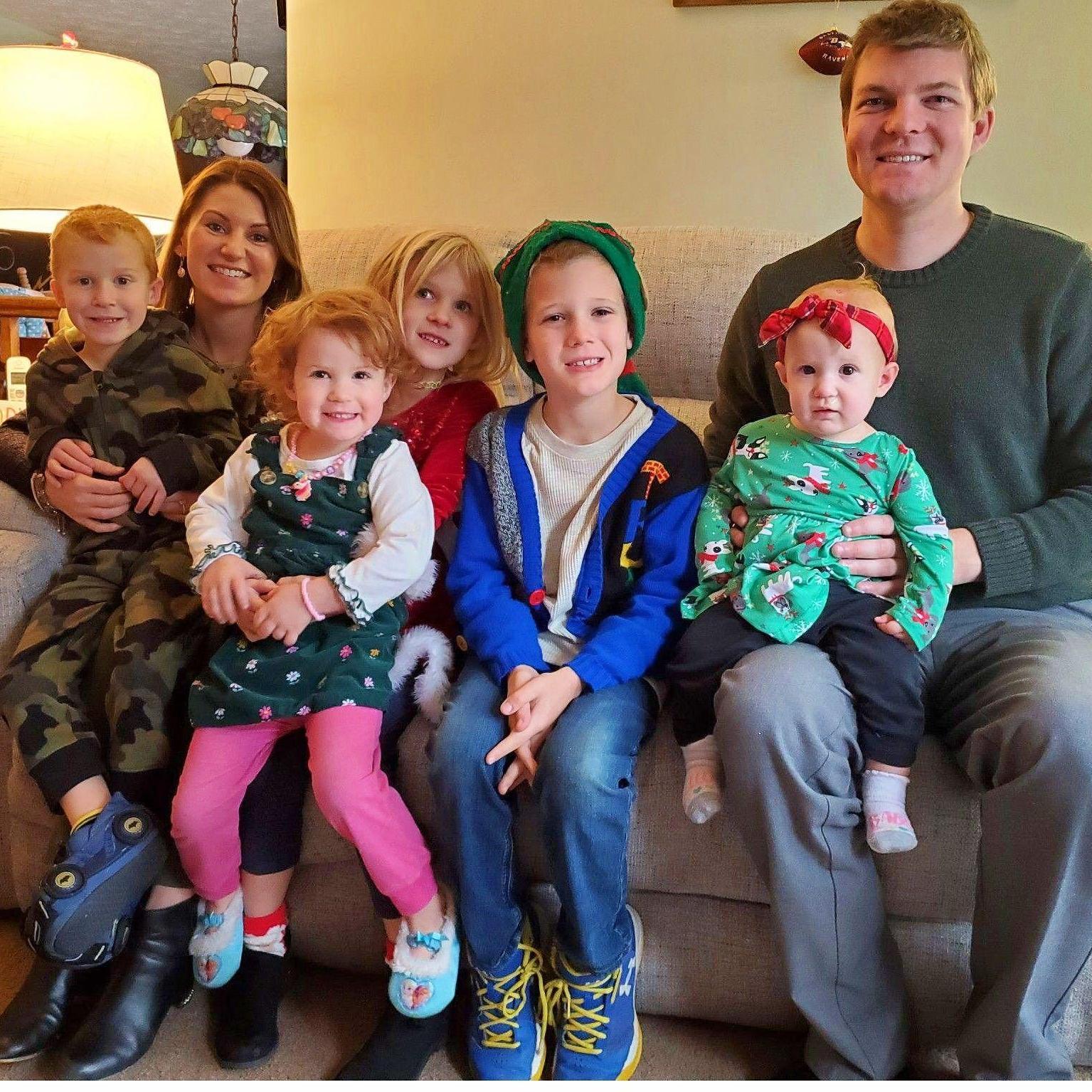 A Christmas photo with the ring bearers and flower girls