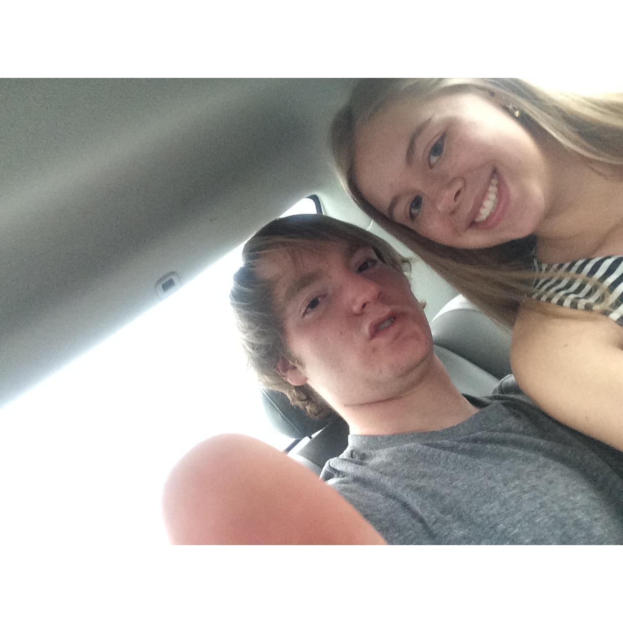 Our first ever photo together...Adam was not quite ready for the picture