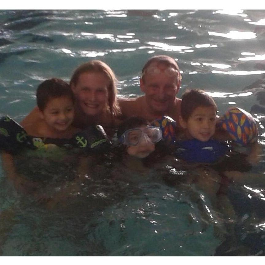 Quite awhile ago- the boys were still in puddle-jumpers, and Katy's struggling to keep afloat! We're doing the Family Swim thing at the Y pool.