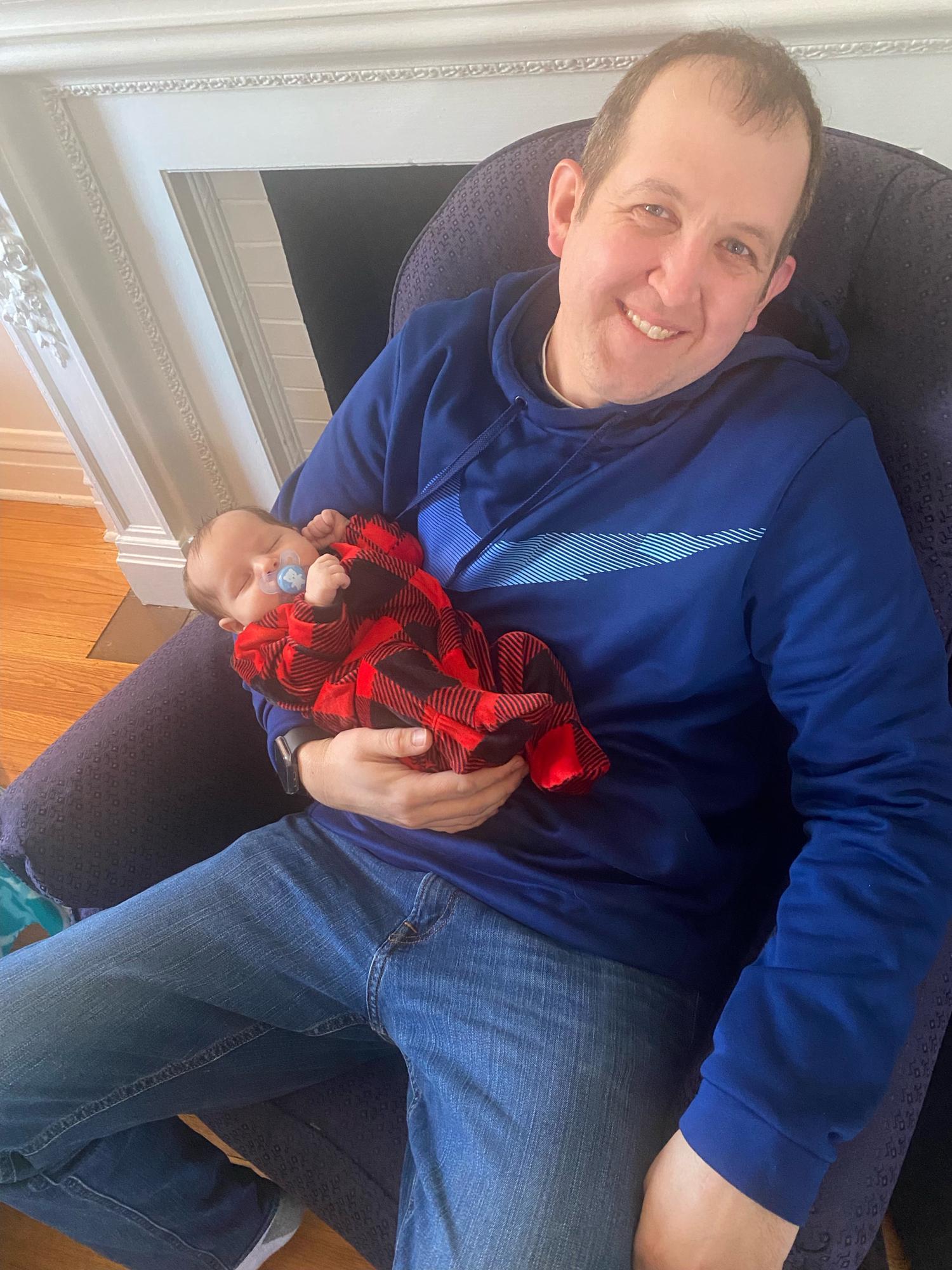 Joe holding his niece Wesley