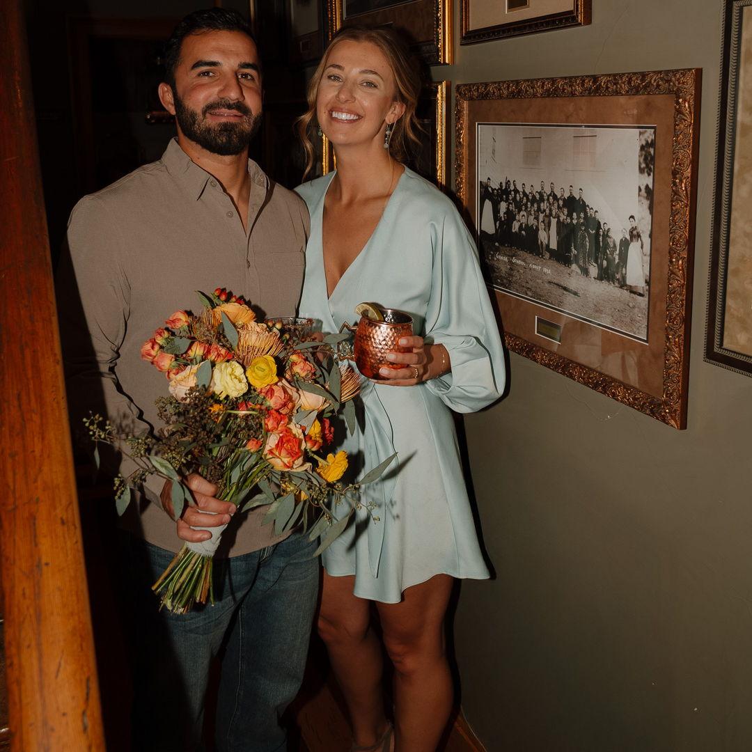 Grabbing a drink at The Pink House following our courthouse wedding
