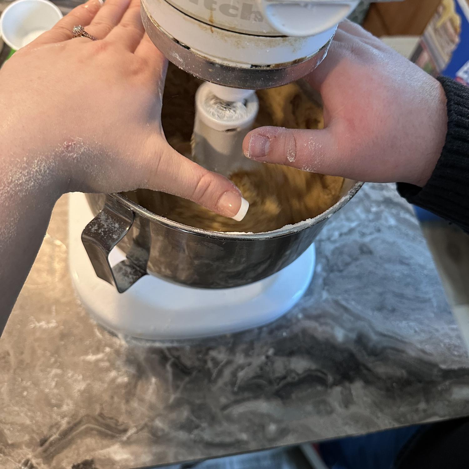 Candid (mostly) engagement photos while making Christmas cookies!